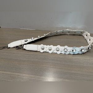 White Floral Bag Strap with silver detail.